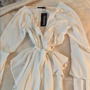 Tie waist frill sleeve wrap blouse